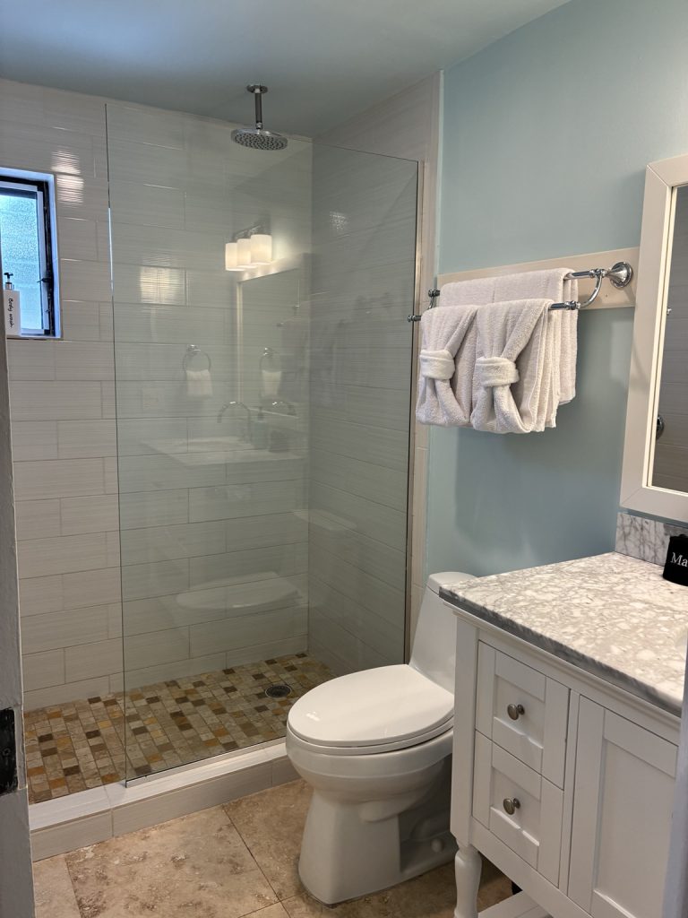 Bird of Paradise bathroom with walk-in shower