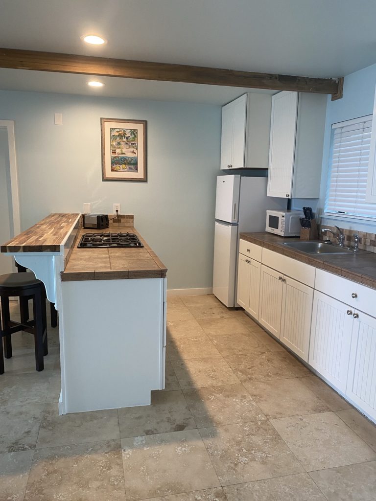 Hibiscus kitchen with island and refrigerator