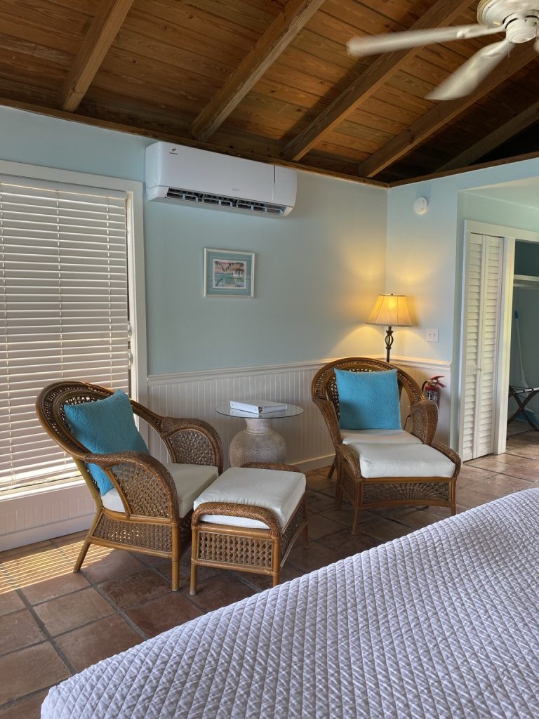 Orchid sitting area with chairs and television